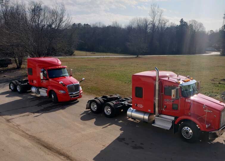 Direct Inc Two Red Semi Truck